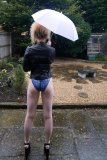2015-08-14 Jazz in blue M&S croc skin swimsuit, in the garden, in the rain