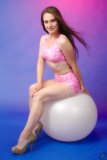 2019-09-21 Kristine Gold - in matching tight pink-and-white lycra sports bra top and shorts set