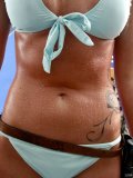 2019-02-10 JaySeaW outtake, wearing her own pale blue bikini. Wet-look achieved with baby oil and a fine mist of warm water.