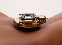 Caleann poses with vintage Bausch & Lomb shutter c/w Beck lens assembly on her tightly tucked-in tummy