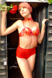 Momo modelling dance top and matching pocket girdle, showing off her lovely flat tummy as she emerges from the old shed, during her first retro fitness shoot 2014-08-24