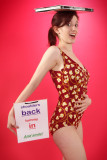 Dawsie performs her deportent exercises whilst posing in vintage tummy-control swimsuit