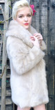 Abbie 2015-01-02 in the garden modelling her own fur coat