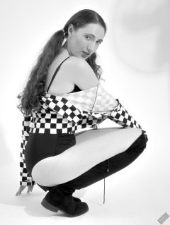 2026-08-01 Estella Rose models black one-piece swimsuit and accessories..