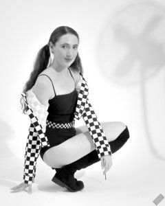 2026-08-01 Estella Rose models black one-piece swimsuit and accessories..
