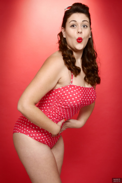 2018-12-15 Darcy Bennet in her own red and white polka-dot one-piece swimsuit