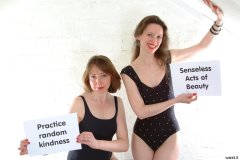 Debbie and Chiara in black one-piece swimsuits