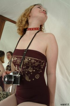 Annie modelling maroon one-piece swimsuit