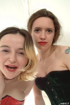 Annie and Chiara messing about in their tightly-laced corsets