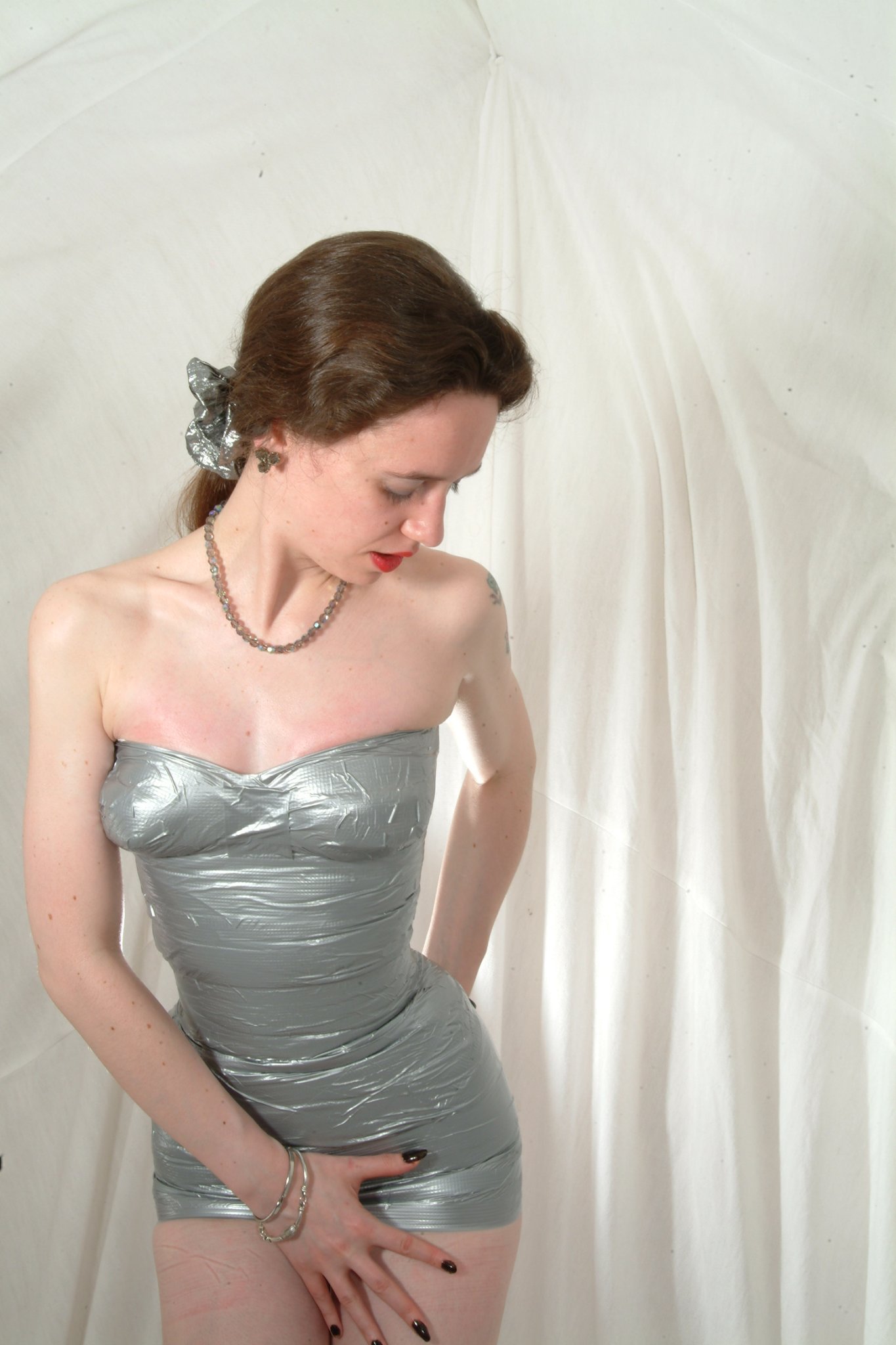 Chiara models silver gaffer tape dress