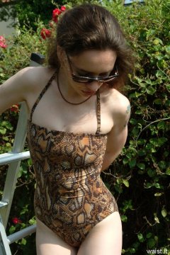 Chiara in animal print one-piece swimsuit