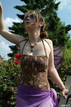 Annie in animal print one-piece swimsuit