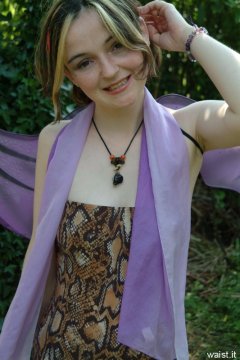Annie in animal print one-piece swimsuit
