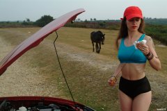 Chiara in blue top and black Dim-Up pantie girdle worn a hot pants