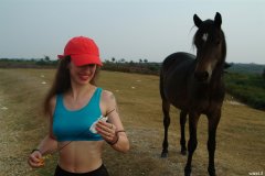 Chiara in blue top and black Dim-Up pantie girdle worn a hot pants