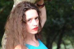 Chiara in blue top and black Dim-Up pantie girdle worn a hot pants