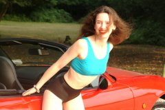 Chiara in blue top and black Dim-Up pantie girdle worn a hot pants