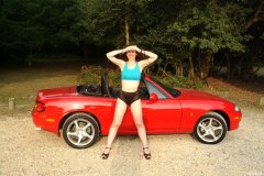 Chiara in blue top and black Dim-Up pantie girdle worn a hot pants