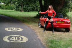 Chiara wears her Dim Up's as hot pants, in the New Forest, with red Mazda MX5