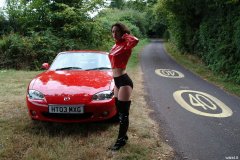Chiara wears her Dim Up's as hot pants, in the New Forest, with red Mazda MX5