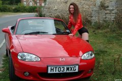 Chiara wears her Dim Up's as hot pants, in the New Forest, with red Mazda MX5