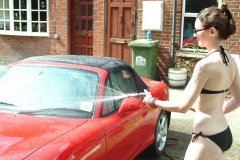 Chiara 'bikini carwashes' a red MX5