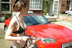 Chiara 'bikini carwashes' a red MX5