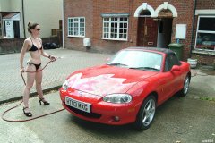 Chiara 'bikini carwashes' a red MX5
