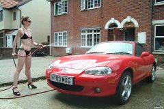 Chiara 'bikini carwashes' a red MX5