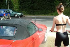 Chiara 'bikini carwashes' a red MX5