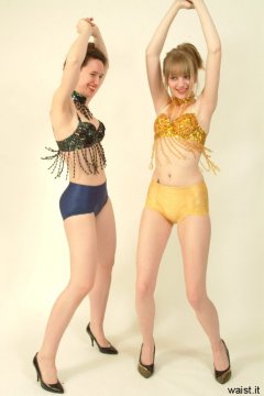 Chiara and Carlie modelling matching dance tops and control pants