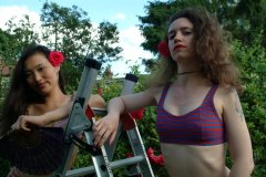 Moonlit Jane and Chiara pose in bikinis in the garden