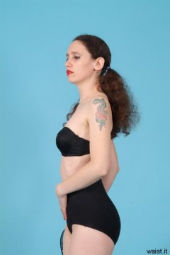 Chiara, shows of her figure in black strapless bra and firm control pantie girdle