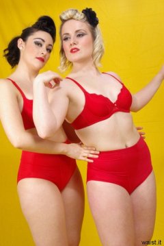 Tanya and Fiona work on their posture whilst modelling red bras and girdles