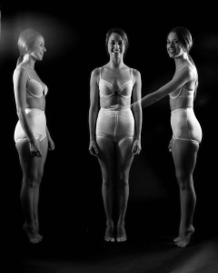 Josie Lauren in vintage white bra and firm "Little X" pantie girdle, strobe experiment