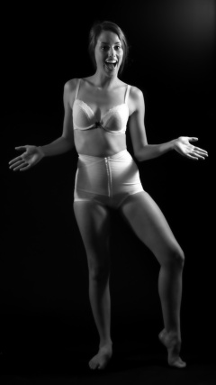 Josie Lauren in vintage white bra and firm "Little X" pantie girdle, strobe experiment