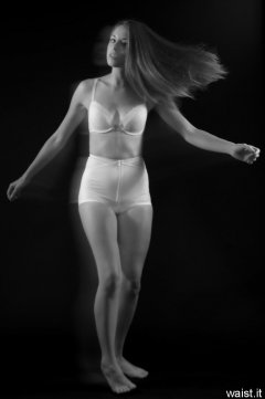 Josie Lauren in vintage white bra and firm "Little X" pantie girdle, strobe experiment