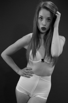 Josie Lauren in vintage white bra and firm "Little X" pantie girdle, strobe experiment