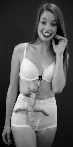 Josie Lauren in vintage white bra and firm "Little X" pantie girdle, strobe experiment