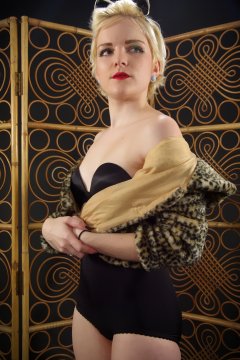 Abbie animal print jacket, black bra and girdle