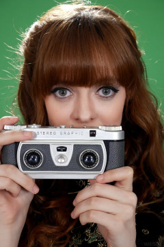 Kirsten-Ria headshot c/w Wray Stereographic camera