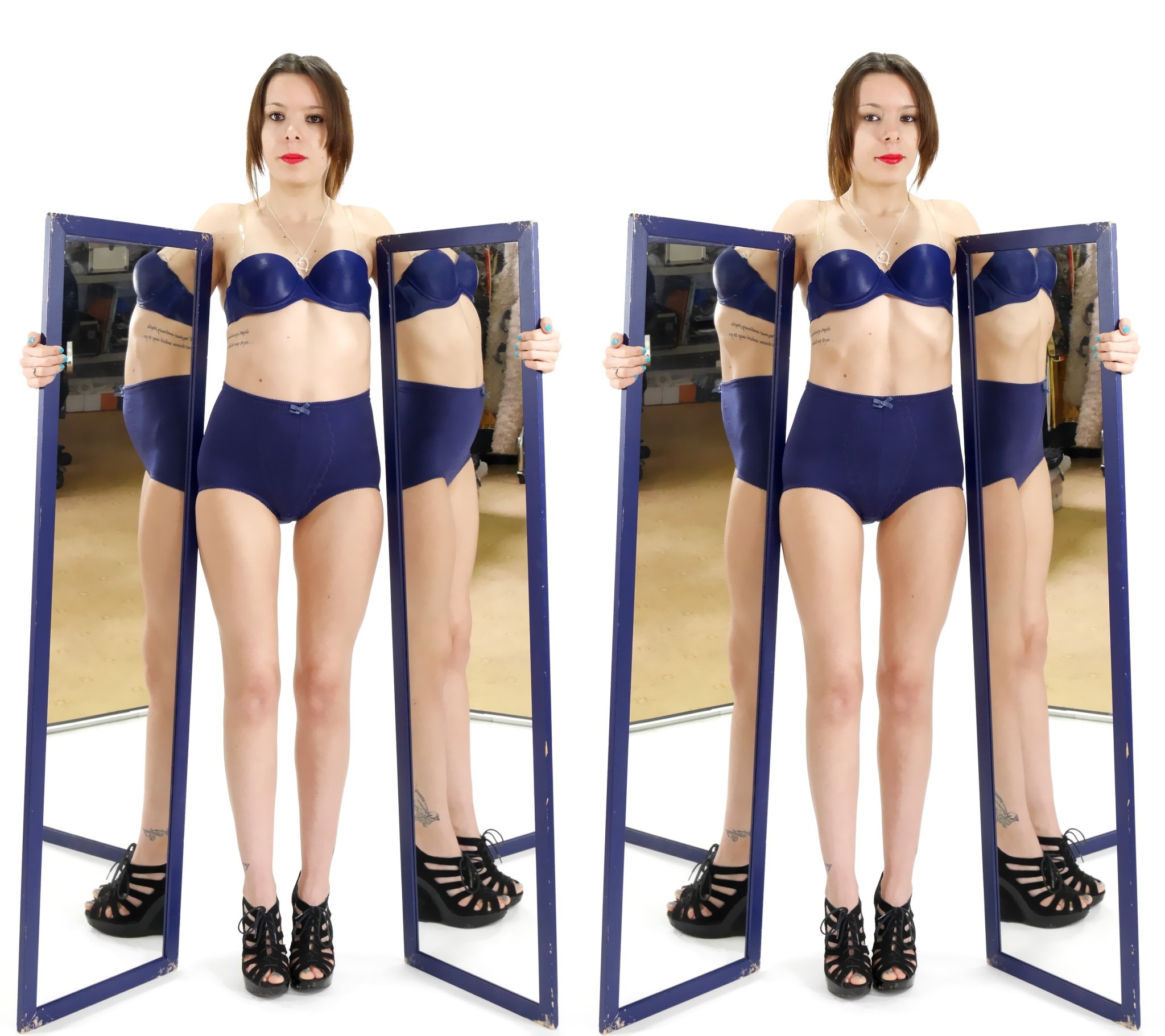 2015-03-21 LTidy, blue bra and girdle, pulling in her tummy.