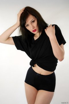 Olive Cartley t-shirt and black conrol briefs worn as hotpants