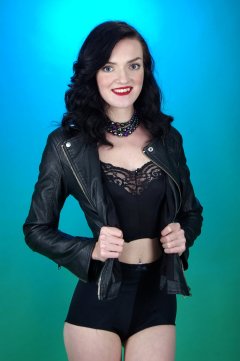 2015-10-24 Jodi Beth black leather jacket and black pantie girdle worn as hotpants