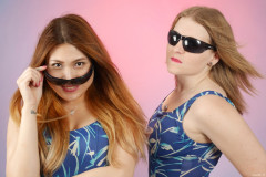 2015-12-11 Laura Toy and Chelskii headshot - wearing blue BHS one-piece tummy-control swimsuits and sunglasses