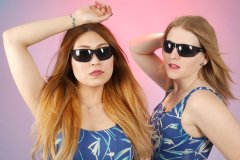 2015-12-11 Laura Toy and Chelskii headshot - wearing blue BHS one-piece tummy-control swimsuits and sunglasses