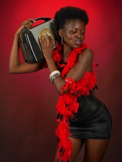 2016-01-15 Lilli in red bra, black Skort and tightly-laced black corset