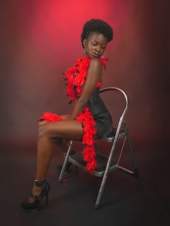 2016-01-15 Lilli in red bra, black Skort and tightly-laced black corset