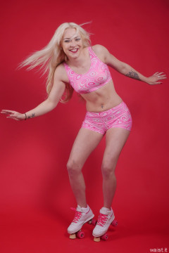 2016-04-23 Dayna Nirvana roller skating in pink two piece costume
