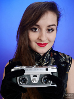 2016-12-04 Nannina in full-length cheongsam holding Wray Stereographic camera